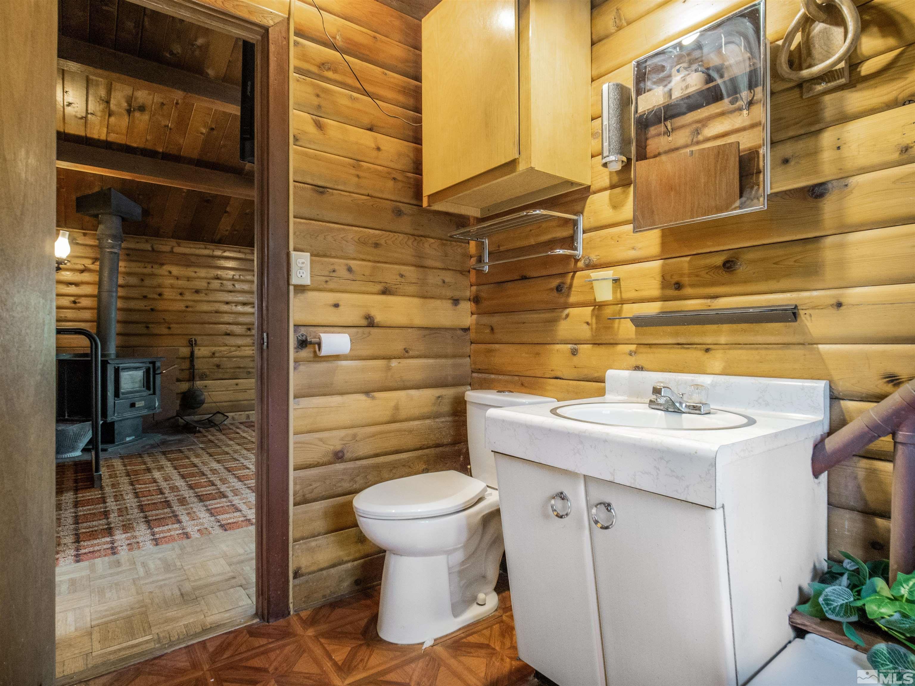 77 Ox Bow Markleeville, CA 96120 - Photo 24 of 33 a bathroom with a sink a toilet and shower