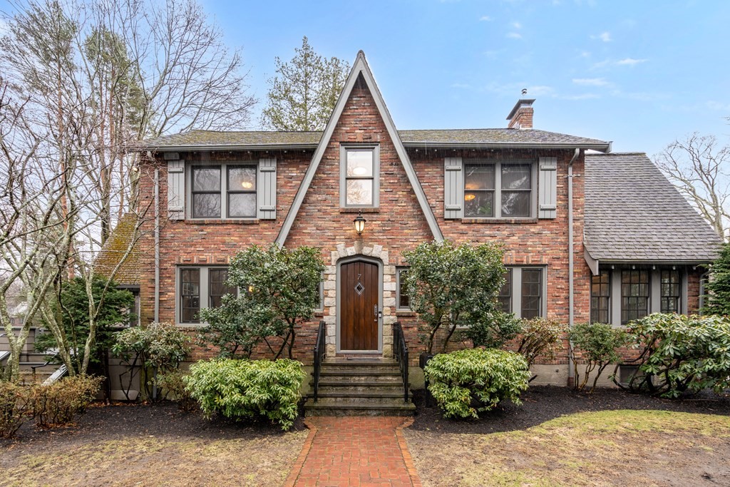 7 Stanley Road Newton, MA 02468 - Photo 1 of 18 a front view of a house with garden