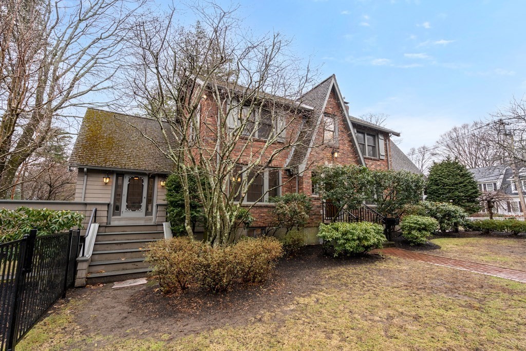7 Stanley Road Newton, MA 02468 - Photo 15 of 18 a front view of a house with stairs