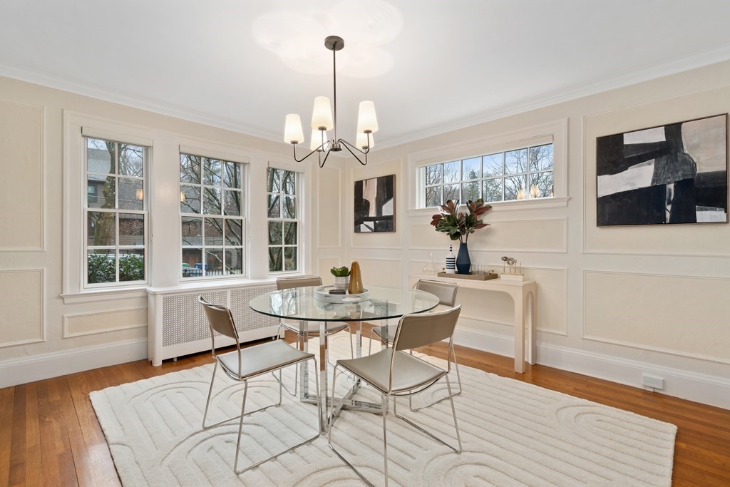 7 Stanley Road Newton, MA 02468 - Photo 6 of 18 a view of a dining room with furniture window and wooden floor