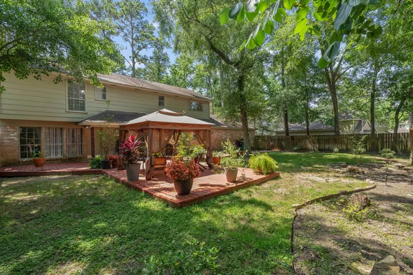 $580,000 | 2828 South Logrun Circle, The Woodlands, TX 77380