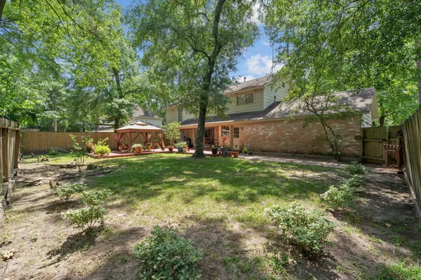 $580,000 | 2828 South Logrun Circle, The Woodlands, TX 77380
