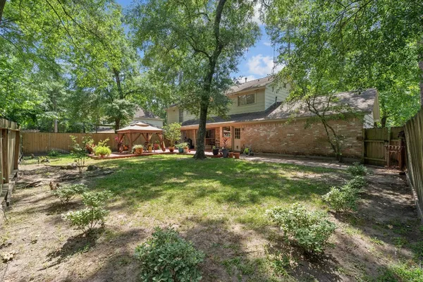 $580,000 | 2828 South Logrun Circle, The Woodlands, TX 77380
