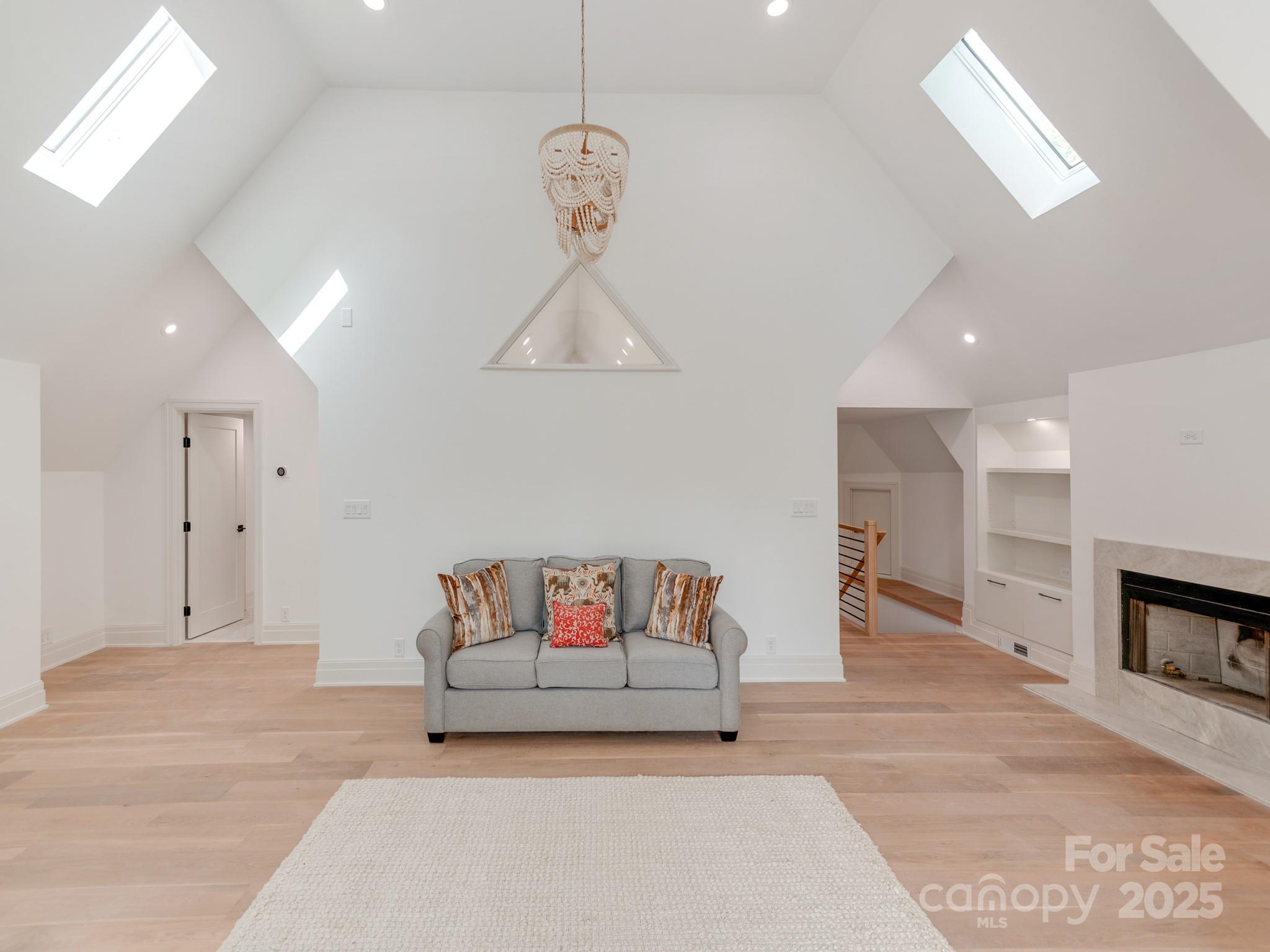 1417 South Wendover Road Charlotte, NC 28211 - Photo 30 of 44 a living room with furniture and a couch