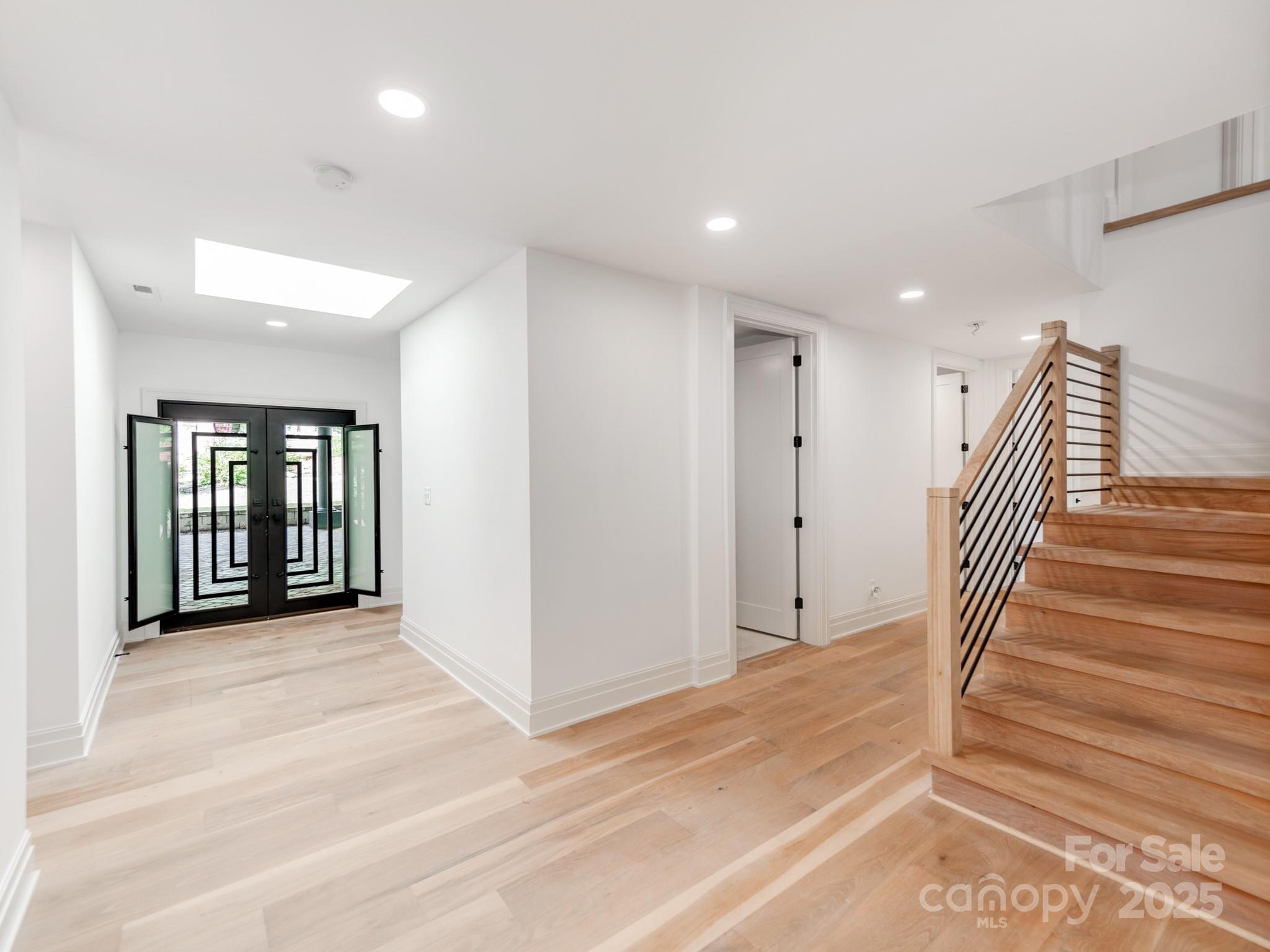 1417 South Wendover Road Charlotte, NC 28211 - Photo 3 of 44 a view of a hallway with staircase