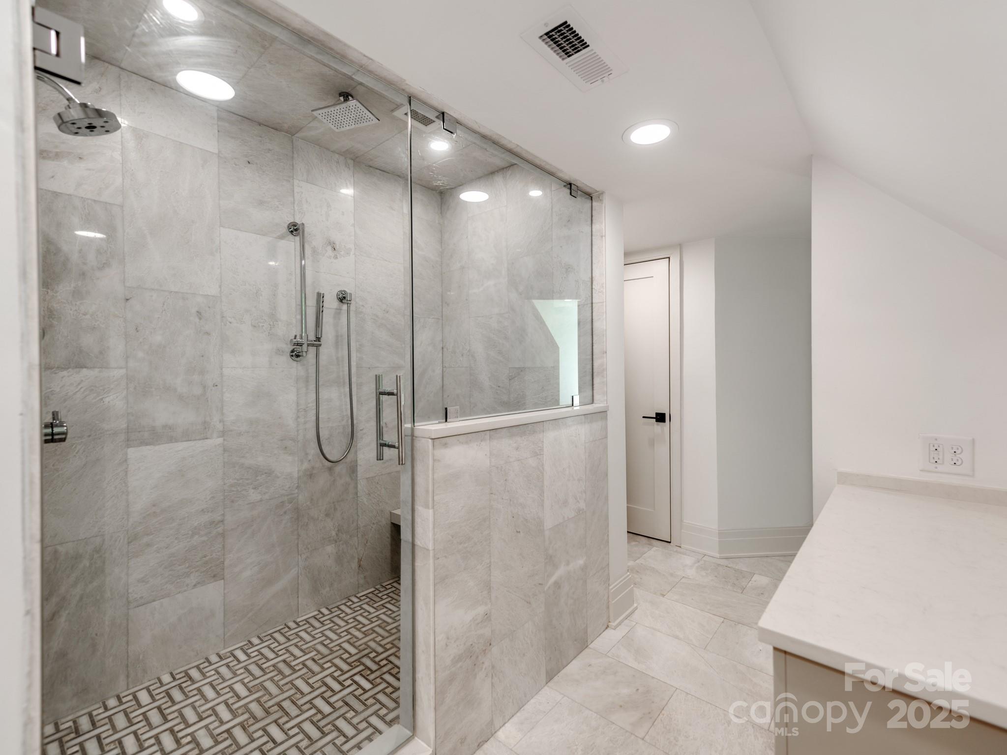 1417 South Wendover Road Charlotte, NC 28211 - Photo 36 of 44 a bathroom with a shower and a sink