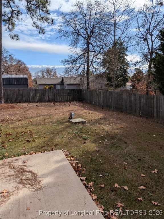 481 Sierra Trail Spring Lake, NC 28390 - Photo 21 of 24 a backyard of a house