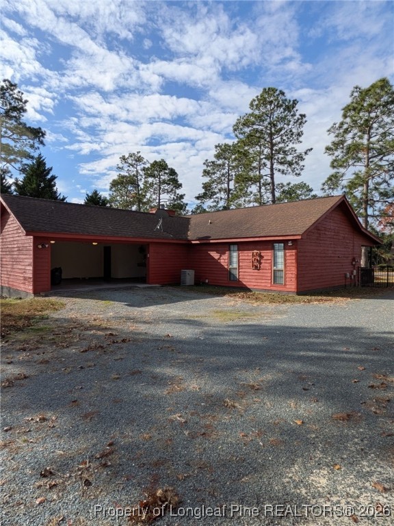 481 Sierra Trail Spring Lake, NC 28390 - Photo 23 of 24 a front view of a house with a yard