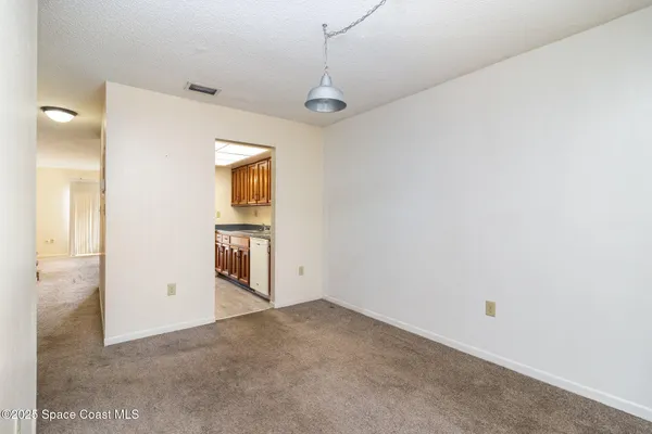 a view of a hallway with closet