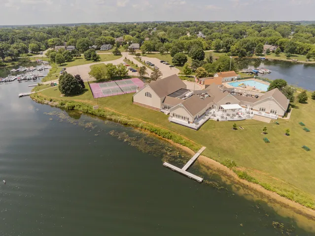 a view of a swimming pool with a lake