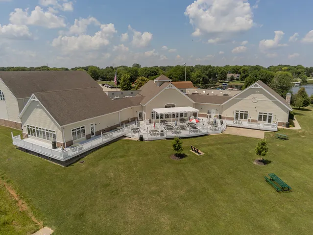 a view of a house with swimming pool