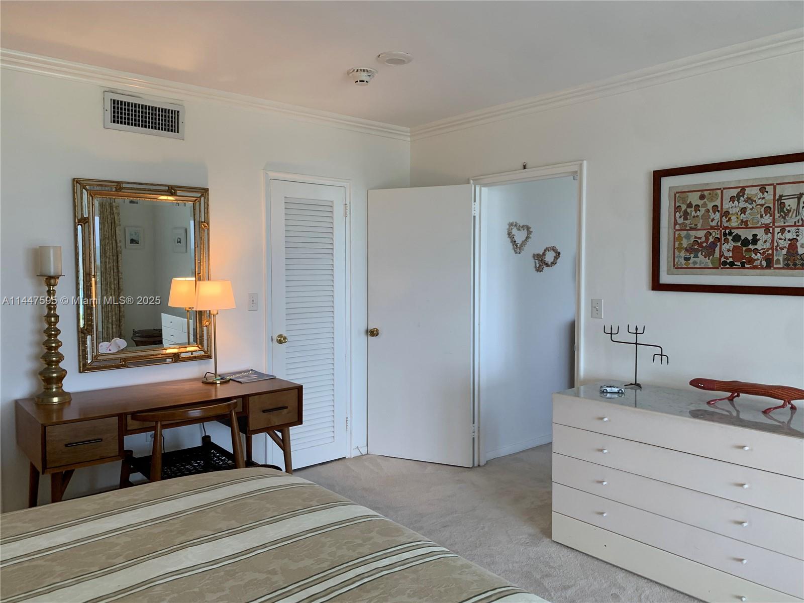 200 Ocean Ln Drive, Unit 706 Key Biscayne, FL 33149 - Photo 15 of 28 a living room with furniture and a table