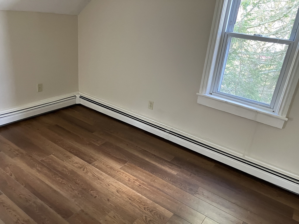 975 South Main Street, Unit 2 Attleboro, MA 02703 - Photo 11 of 17 a view of an empty room with a window