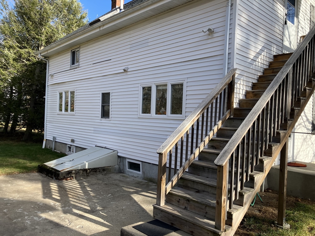 975 South Main Street, Unit 2 Attleboro, MA 02703 - Photo 17 of 17 a view of house with backyard and deck