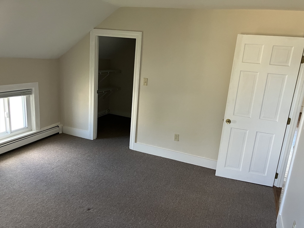 975 South Main Street, Unit 2 Attleboro, MA 02703 - Photo 8 of 17 an empty room with windows