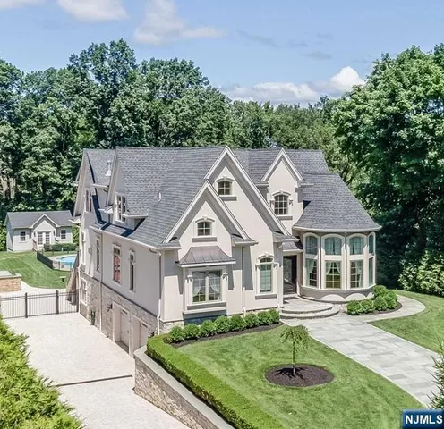 a view of a wrought iron fences in front of house