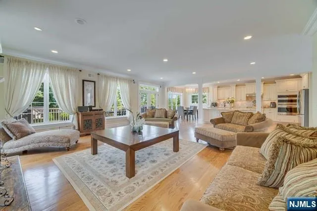 a large bedroom with a bed and a fireplace