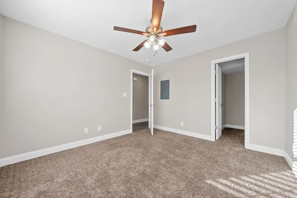 a view of a room with racks on the wall