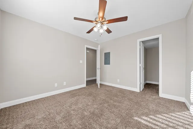 a view of a room with racks on the wall