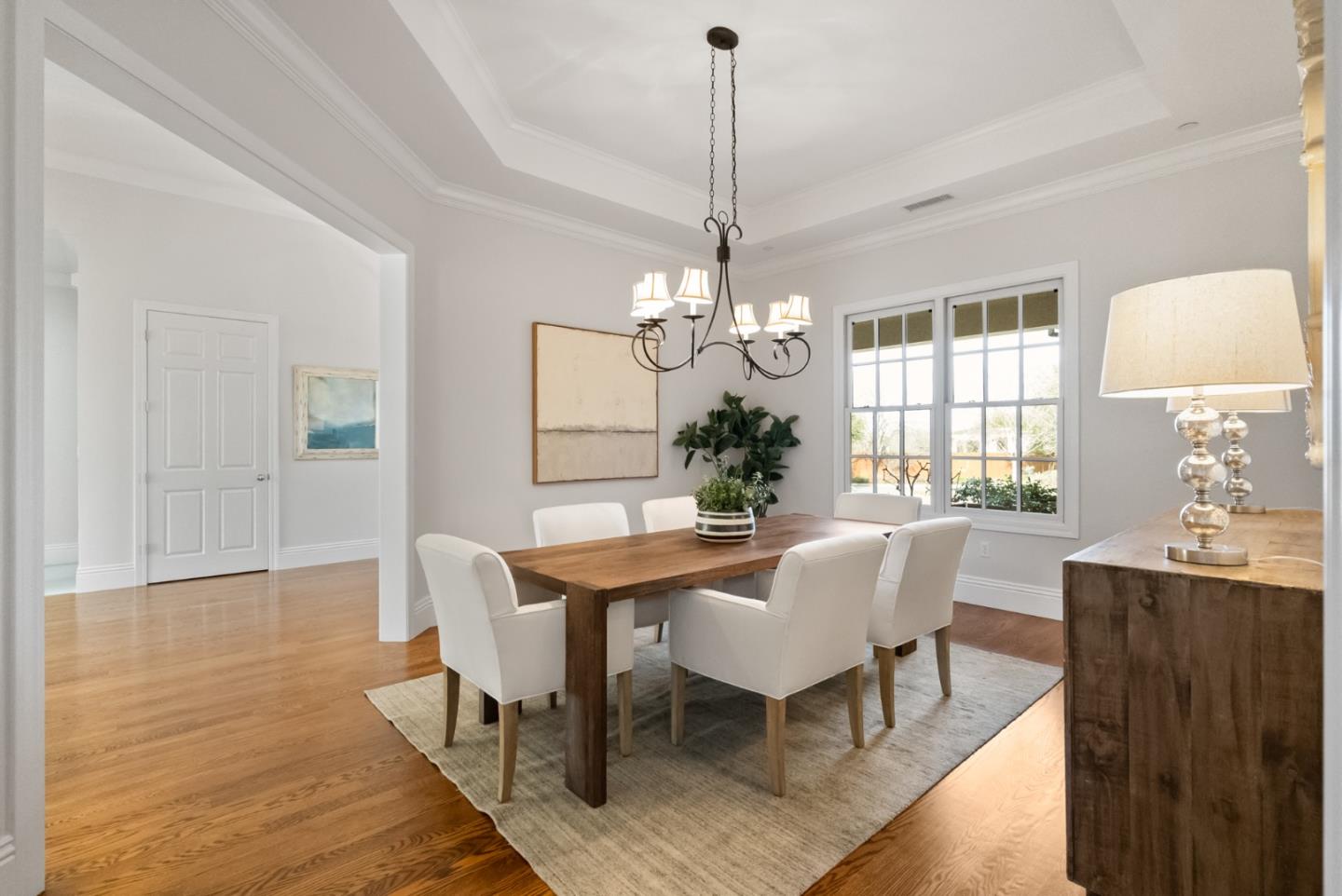 21190 Canyon Oak Way Cupertino, CA 95014 - Photo 14 of 72 a view of a dining room with furniture window and wooden floor