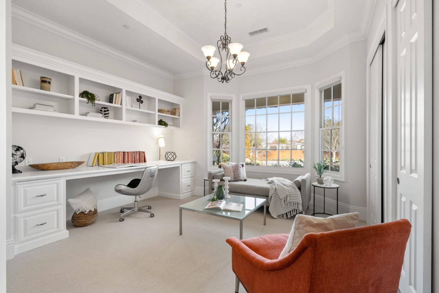 21190 Canyon Oak Way Cupertino, CA 95014 - Photo 22 of 72 a living room with furniture and a chandelier