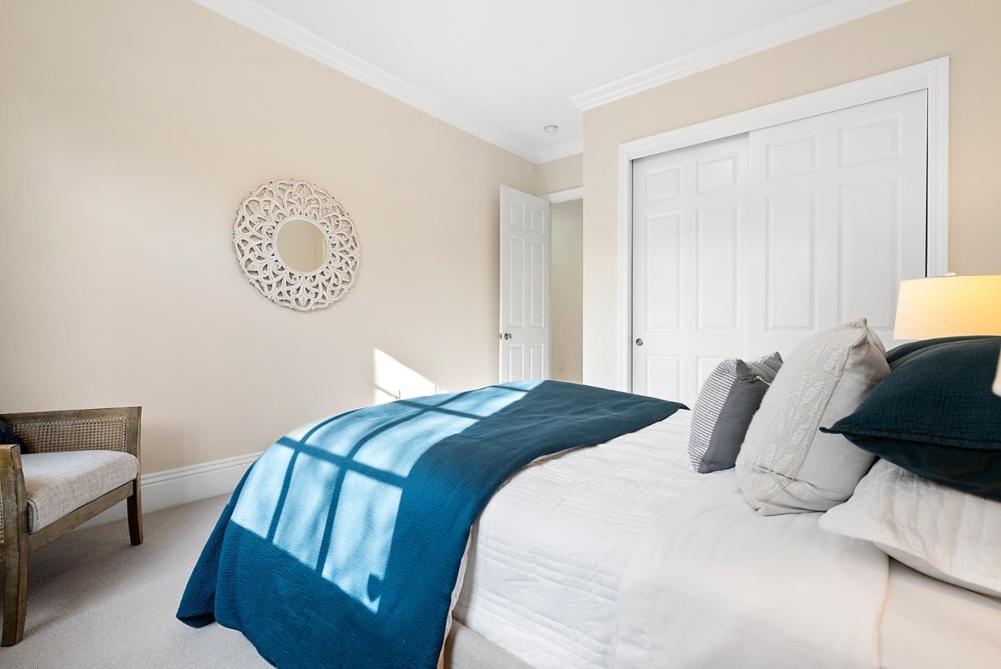 21190 Canyon Oak Way Cupertino, CA 95014 - Photo 25 of 72 a bedroom with a bed a couch and a potted plant