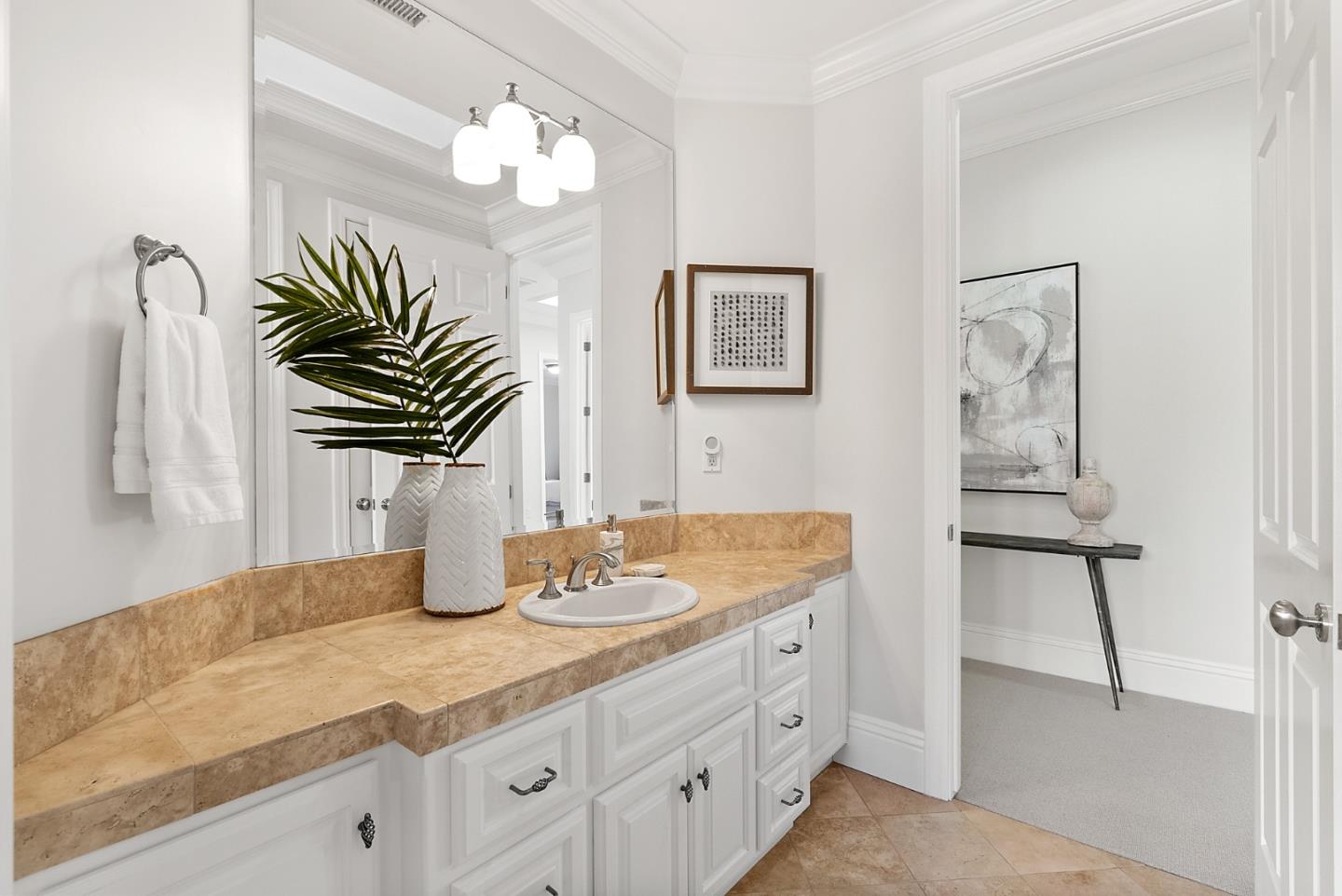 21190 Canyon Oak Way Cupertino, CA 95014 - Photo 33 of 72 a bathroom with a sink a vanity and a mirror
