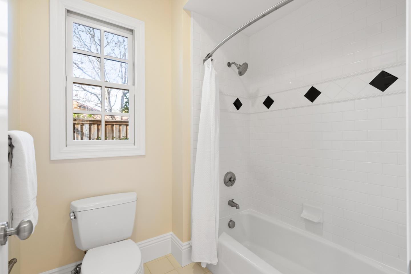21190 Canyon Oak Way Cupertino, CA 95014 - Photo 40 of 72 a bathroom with a toilet and a shower