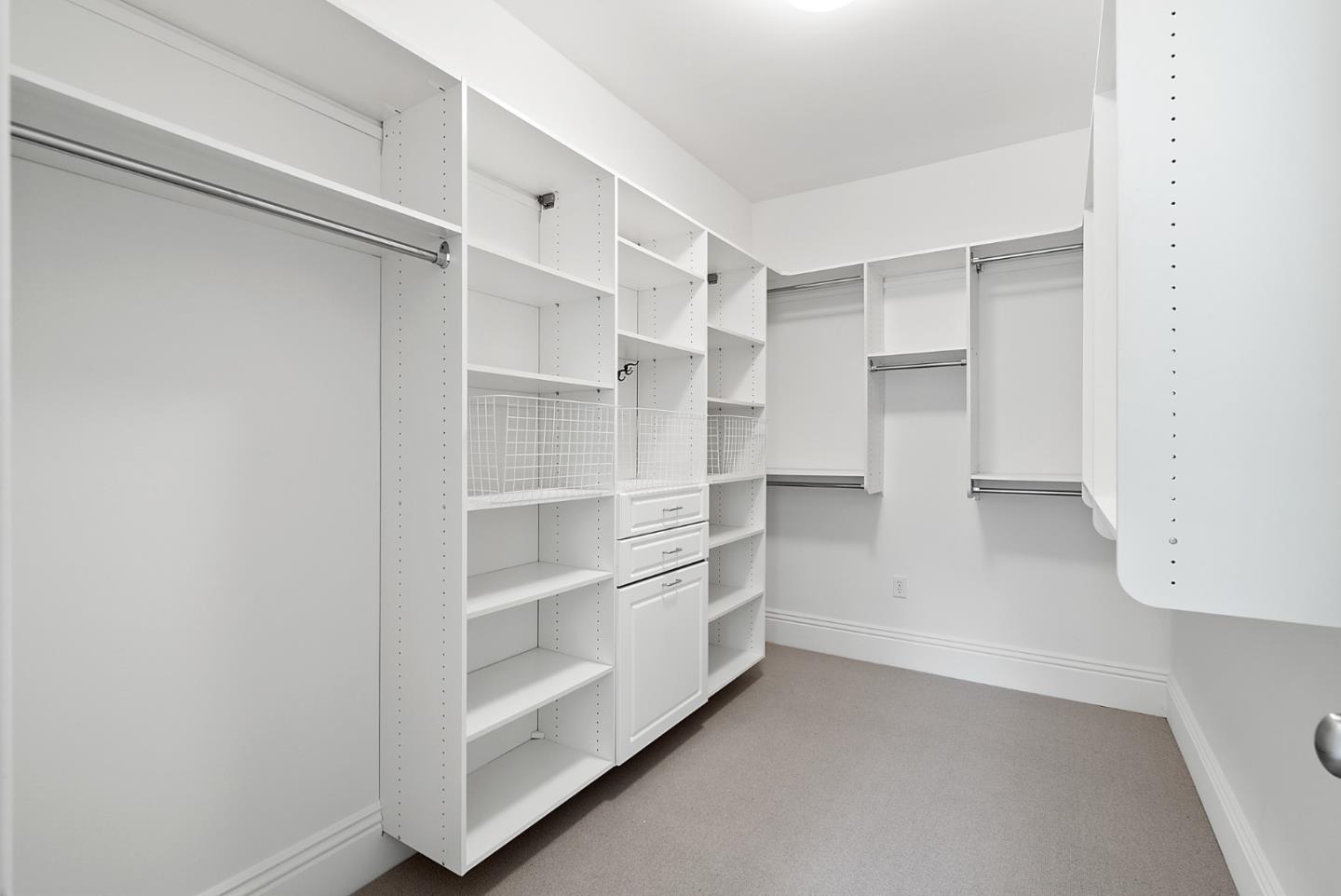 21190 Canyon Oak Way Cupertino, CA 95014 - Photo 44 of 72 a view of walk in closet with empty racks