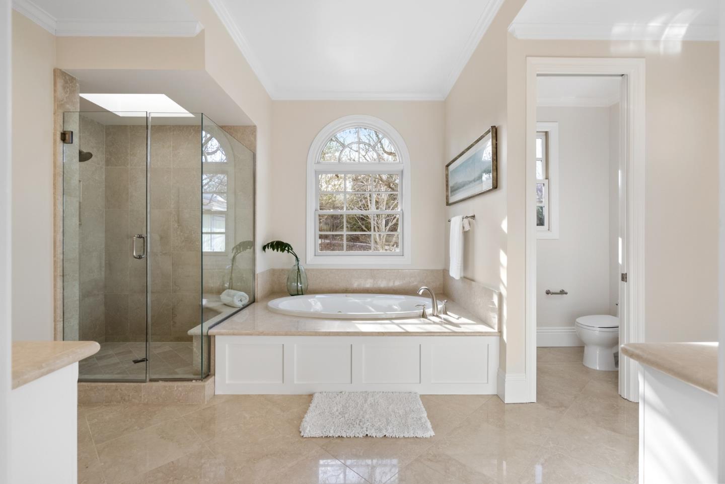 21190 Canyon Oak Way Cupertino, CA 95014 - Photo 45 of 72 a bathroom with a sink toilet and shower