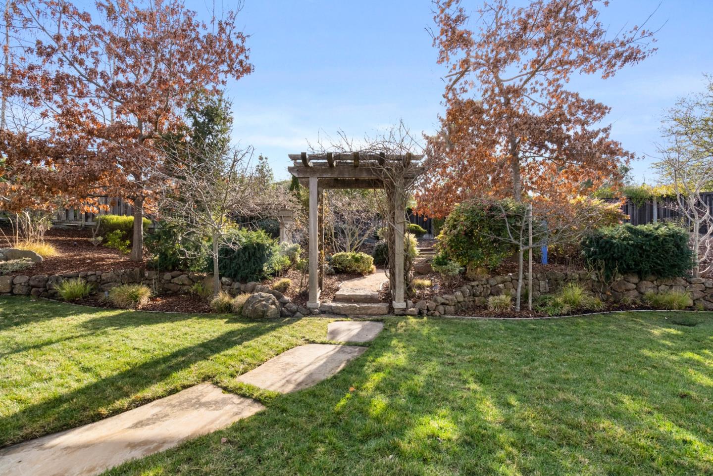 21190 Canyon Oak Way Cupertino, CA 95014 - Photo 53 of 72 a view of a backyard with a garden and trees