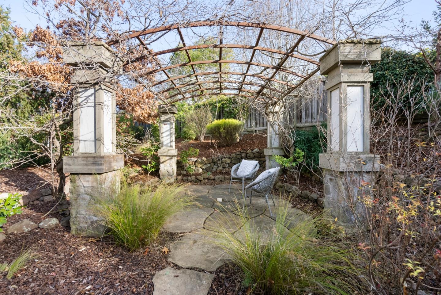 21190 Canyon Oak Way Cupertino, CA 95014 - Photo 55 of 72 a view of an chairs and table in the patio