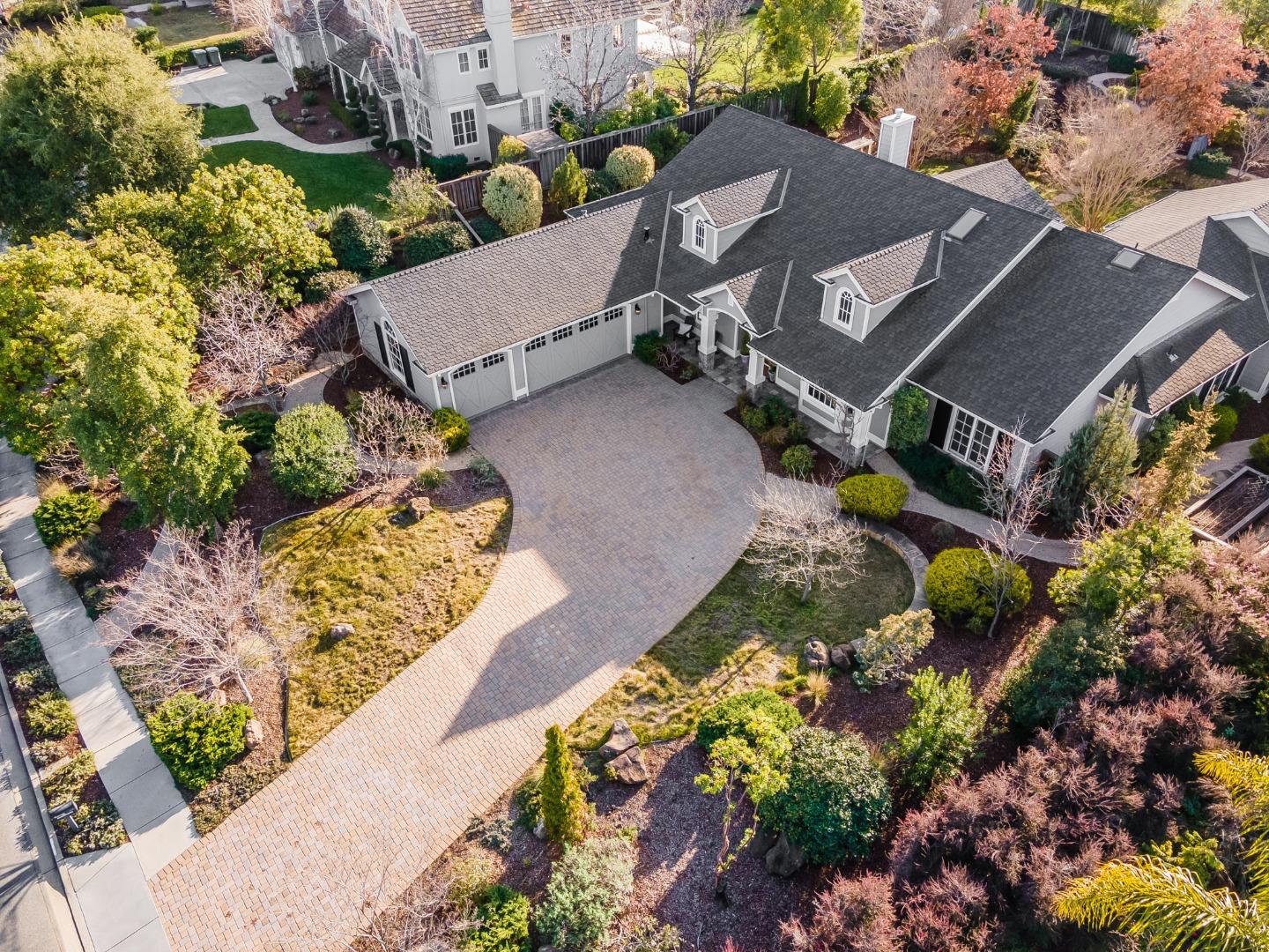 21190 Canyon Oak Way Cupertino, CA 95014 - Photo 70 of 72 an aerial view of a house with a garden and mountain view in back