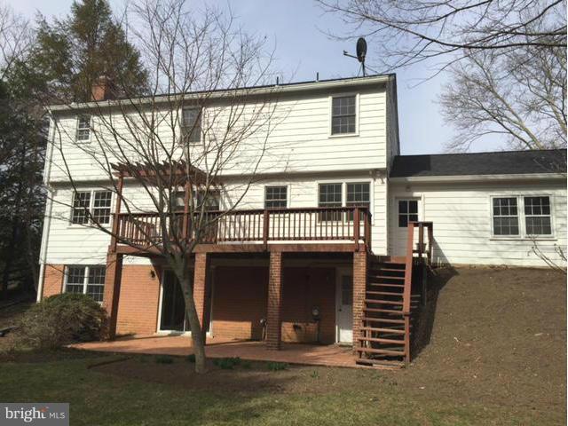 14117 Sturtevant Road Silver Spring, MD 20905 - Photo 28 of 30 a front view of a house with a yard