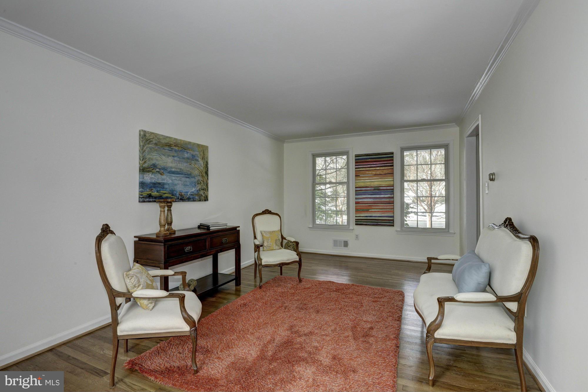 14117 Sturtevant Road Silver Spring, MD 20905 - Photo 9 of 30 a living room with furniture and a window