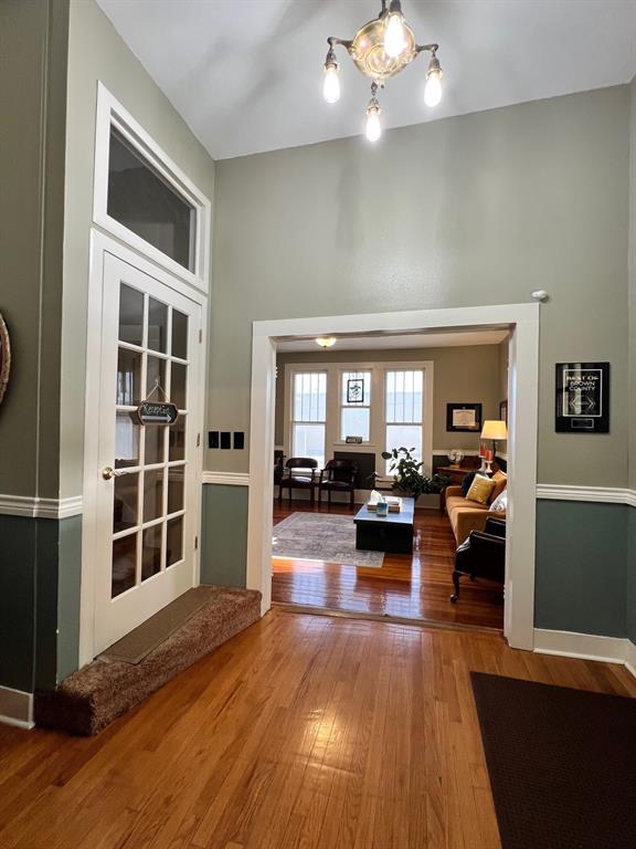 306 North Austin Street Comanche, TX 76442 - Photo 22 of 37 a living room with furniture and wooden floor