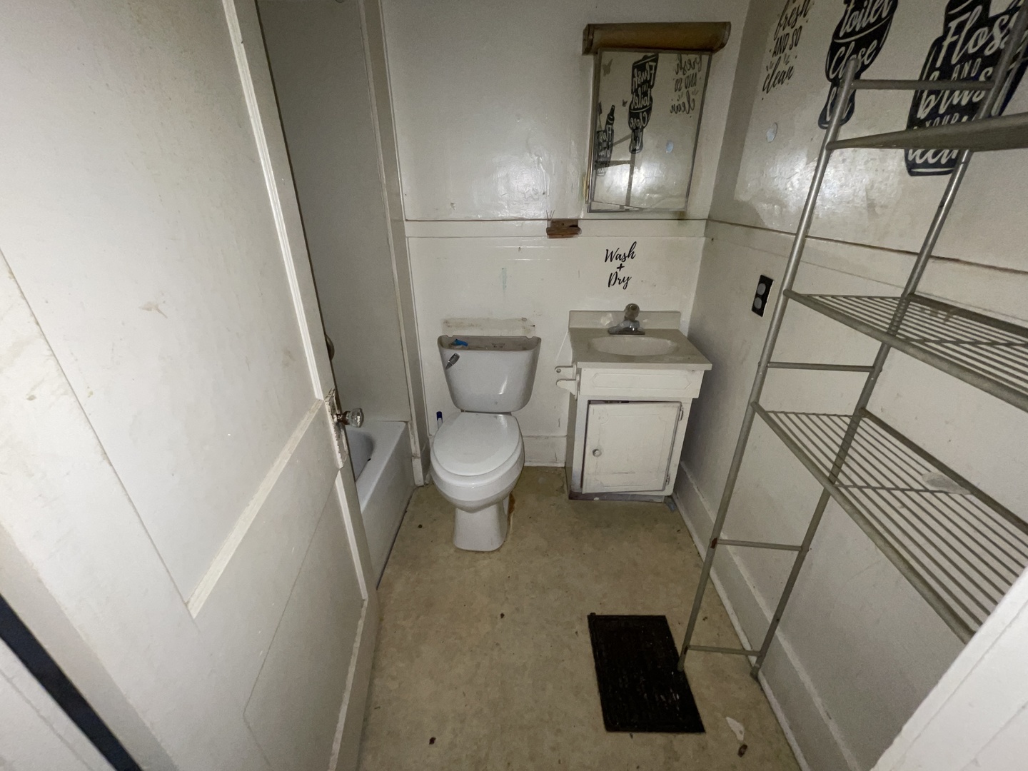 552 West Center Street Decatur, IL 62526 - Photo 11 of 26 a bathroom with a sink and a mirror