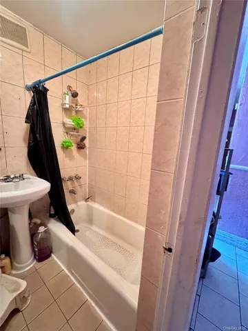 a bathroom with a sink and toilet