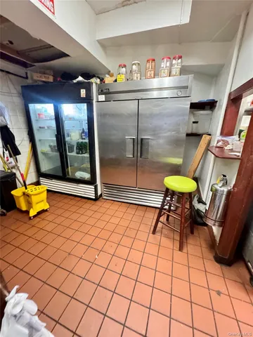 a outdoor view of a building with sitting area