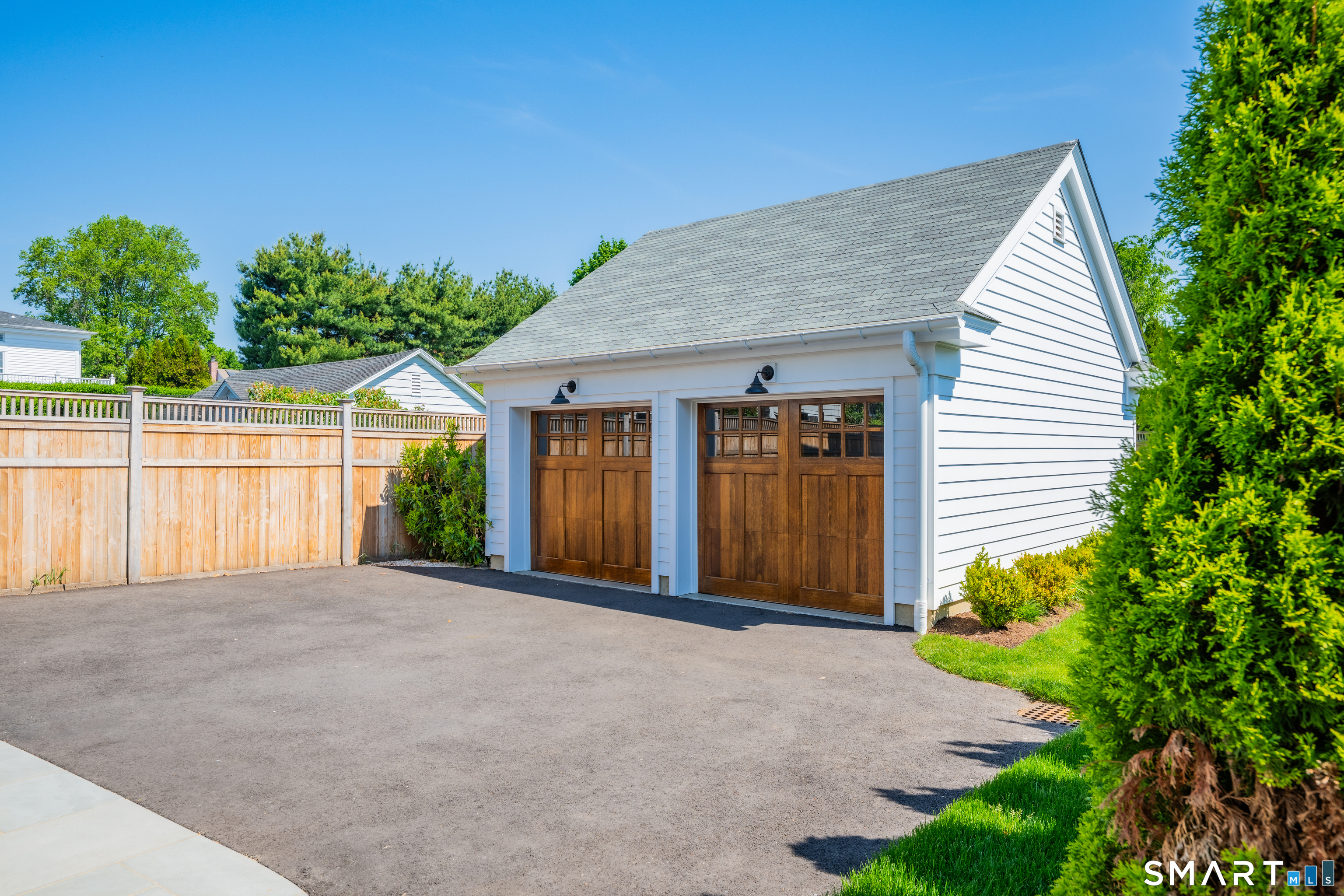 920 Old Post Road Fairfield, CT 06824 - Photo 35 of 40 2 car garage with loft space (great storage), a few steps from the back door entrance