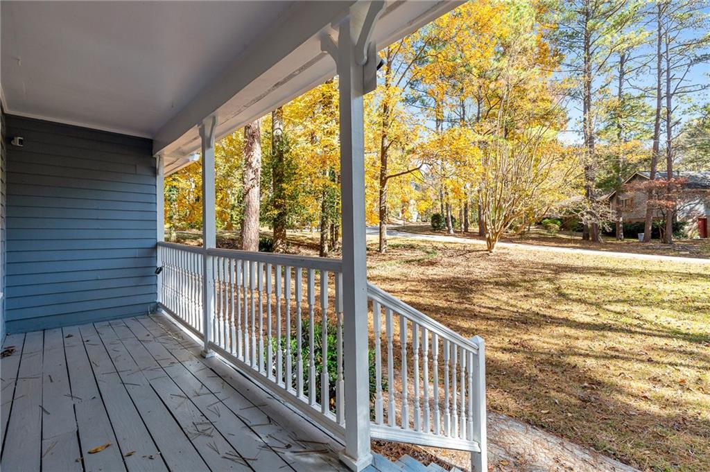 800 Post Rd Circle Stone Mountain, GA 30088 - Photo 4 of 45 a view of a room with wooden floor and fence