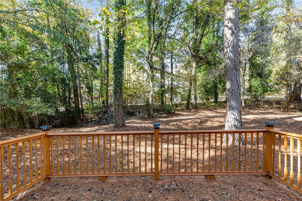800 Post Rd Circle Stone Mountain, GA 30088 - Photo 41 of 45 a view of a yard with large trees