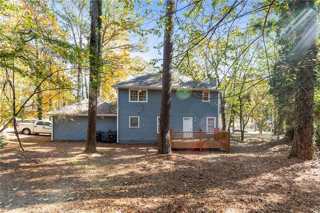 800 Post Rd Circle Stone Mountain, GA 30088 - Photo 45 of 45 a view of a house with a yard covered in snow