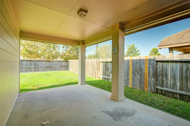 a view of porch with a backyard