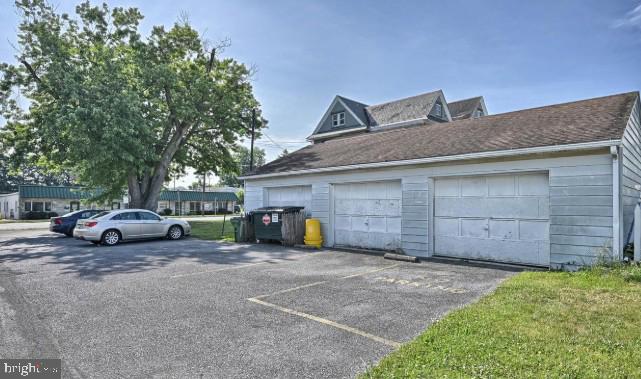 160 Lucknow Road Harrisburg, PA 17110 - Photo 3 of 4 a view of a house with a yard and parking space