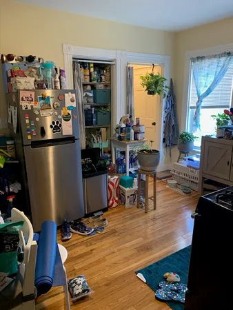 a kitchen with stainless steel appliances granite countertop a stove and a microwave