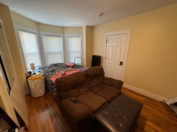 a view of a workspace with furniture and storage