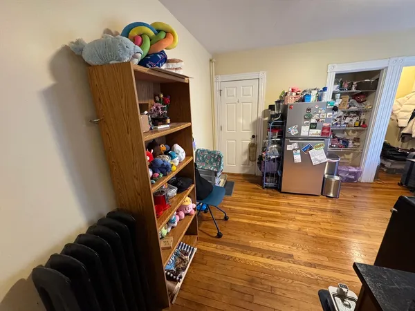 a kitchen with stainless steel appliances a stove a microwave and a refrigerator