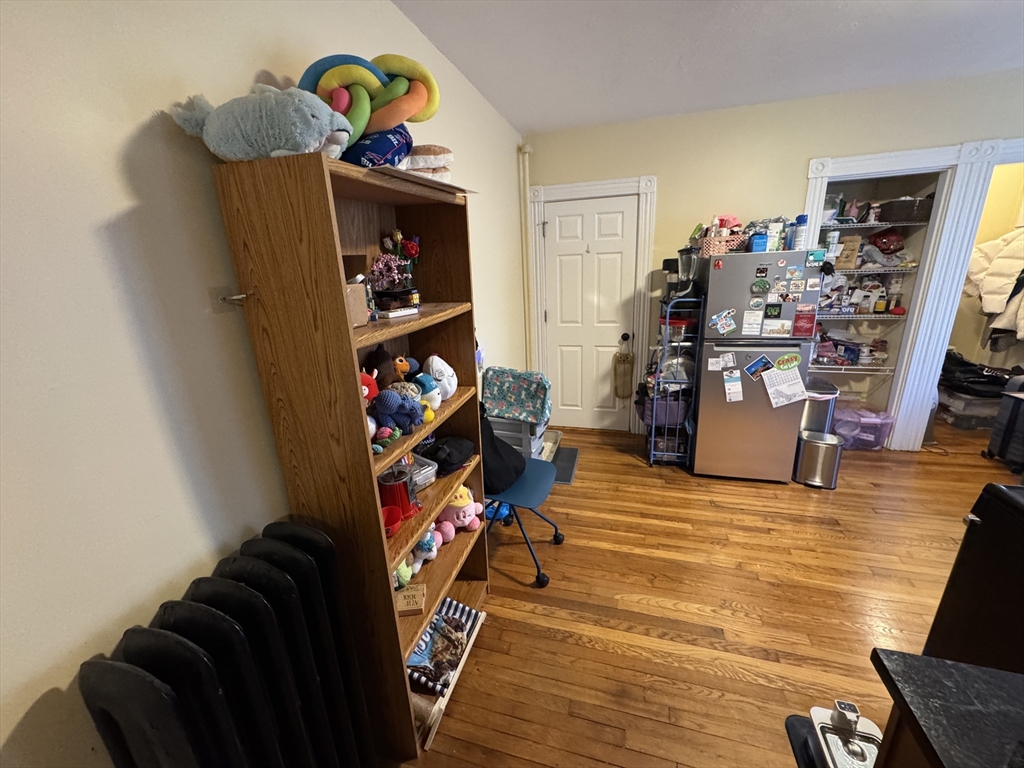 5 Blake Street, Unit 1 Cambridge, MA 02140 - Photo 34 of 41 a view of a workspace with furniture and storage