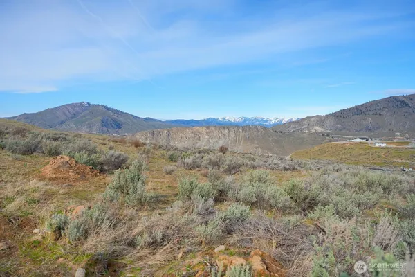 a view of mountains and valleys